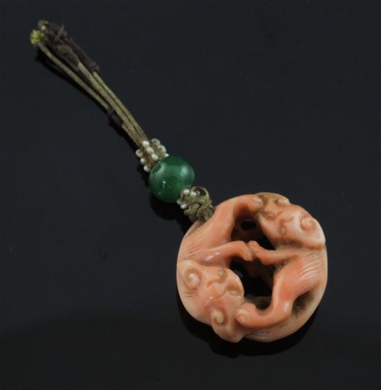 A 19th century Chinese coral pendant, 1in.